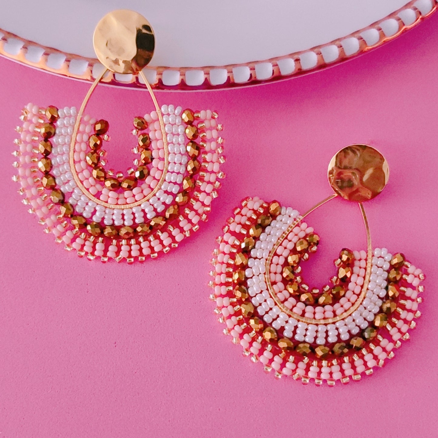 Light rose & gold drops.